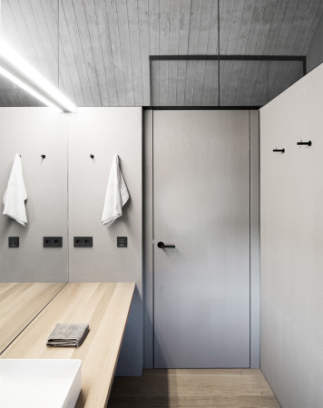 simon oberhofer, ulrike tinnacher, tinnacher, weingut, winzer, winzerfamilie, dmmbeton, isolierbeton, wohnhaus, einfamilienhaus, beton, gefrbter, eichenholz, einbaumbel, einbauschrnke, schiebetren, dielen, neubau, keller, weinkeller, gewlbekeller, kupfer, introvertiert, haus t, steiermark, archaik, purismus