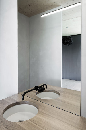 simon oberhofer, ulrike tinnacher, tinnacher, weingut, winzer, winzerfamilie, dmmbeton, isolierbeton, wohnhaus, einfamilienhaus, beton, gefrbter, eichenholz, einbaumbel, einbauschrnke, schiebetren, dielen, neubau, keller, weinkeller, gewlbekeller, kupfer, introvertiert, haus t, steiermark, archaik, purismus