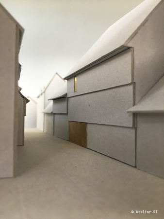 Modellfoto, Blick von S�den: Die wenigen Fenster in der Fassade k�nnen je nach Ausstellung komplett geschlossen werden. Die Variante mit dem kupfernen Eingangstor ist inzwischen wieder vom Tisch.