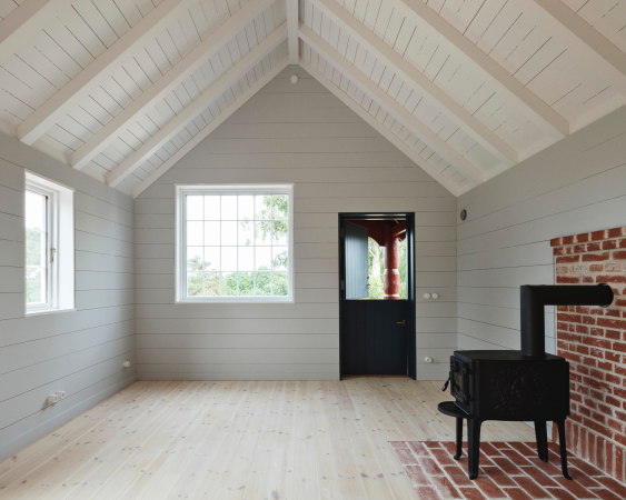 Sanierung einer Holzh�tte von Johansen Skovsted Arkitekter