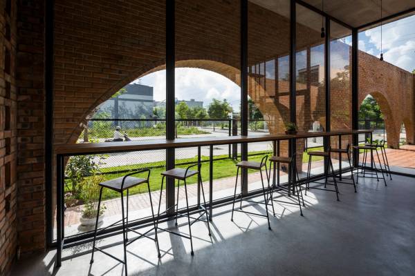 Wohnhaus mit Caf in Vietnam von Tropical Space