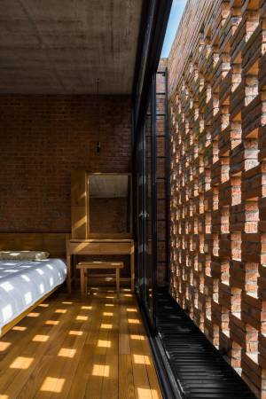 Wohnhaus mit Caf in Vietnam von Tropical Space