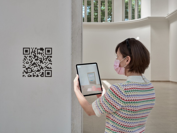 QR-Codes verweisen in den digitalen Raum.