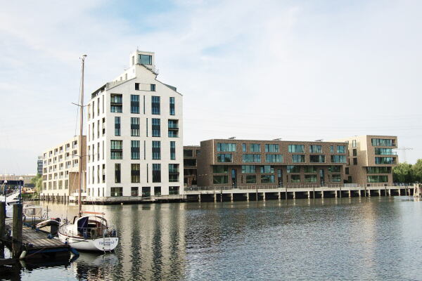 Austausch von Fassaden und Dchern von 6 Wohnhusern und Fertigstellung eines Wohnhochhauses auf der Schlossinsel Harburg