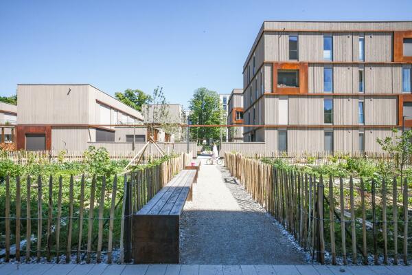 TEAM³ — Ökologische Musterhaussiedlung in Passivhausstandard 2019, München von ArchitekturWerkstatt Vallentin