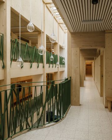 Schulerweiterung in Davos von CURA Architekten